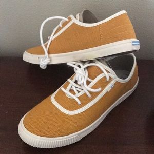 Toms mustard yellow tennis shoes (new)